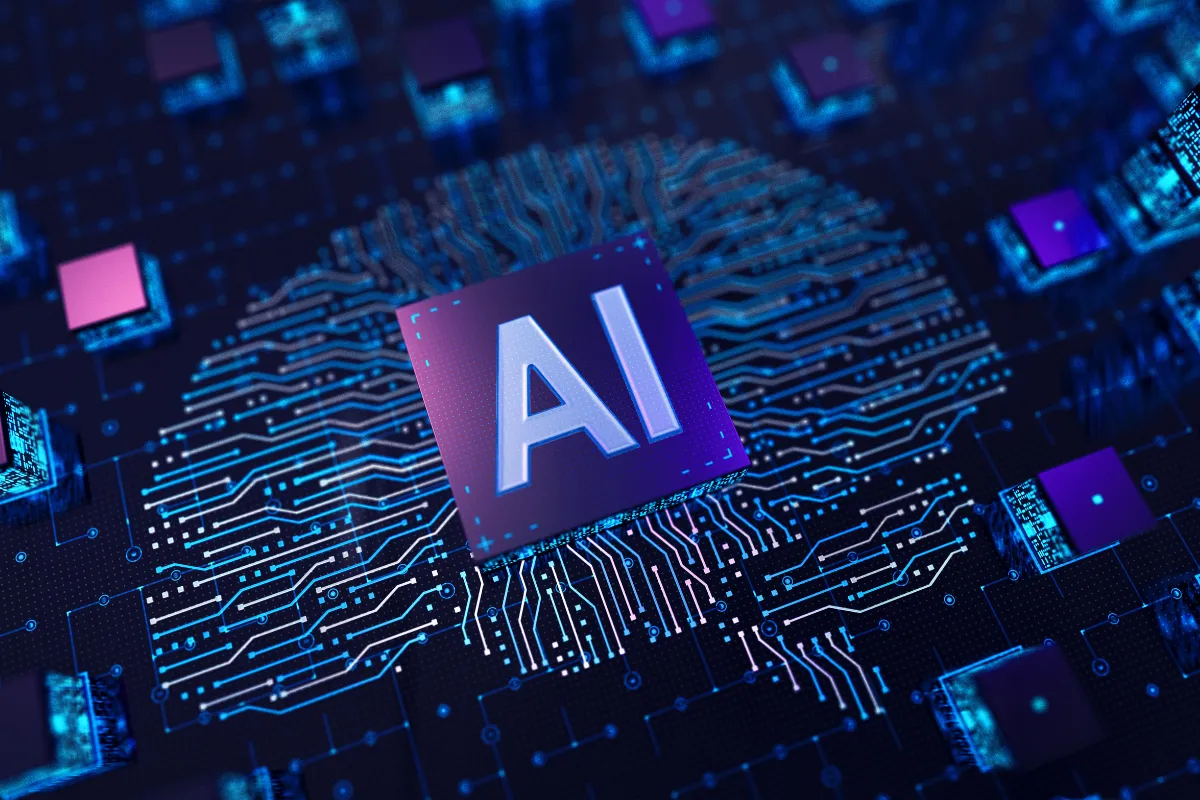 Chip com a sigla AI sobre placa de circuito iluminada, representando a base tecnológica da inteligência artificial